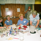 Helene has some fun with Roy Ellen Hammonn while collecting money for the Auction.  Also in picture left Paula Poll and Virginia Melton.