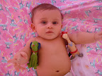 Meu primo! Olho azul iguais aos meus quando pequeno. Só curtindo a sombra da árvore deitado aí na rede.