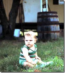 my son in front of our first travel trailer :)