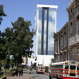 The area in front of Escuela Buenaventura Corrales has just a few empty school buses and a patrol of Fuerza Publica.