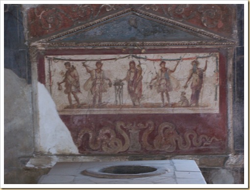 0992 - Pompeya. Termopolium de Vetutius Placidus, presidido por un larario pintado.