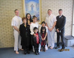 Yamel & Brittany with family at baptism