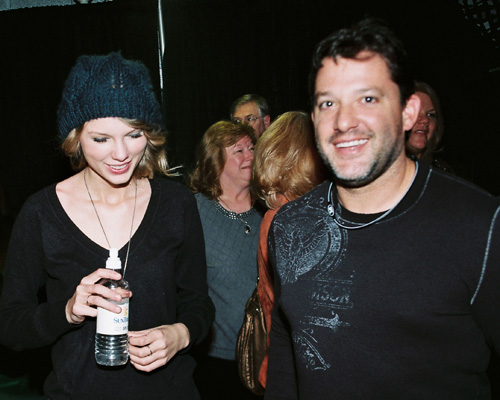 #4340954 Taylor Swift and race car driver Tony Stewart share a laugh and a photo backstage of a country music event in Nashville, TN on January 9, 2010 Fame Pictures, Inc - Santa Monica, CA, USA - +1 (310) 395-0500