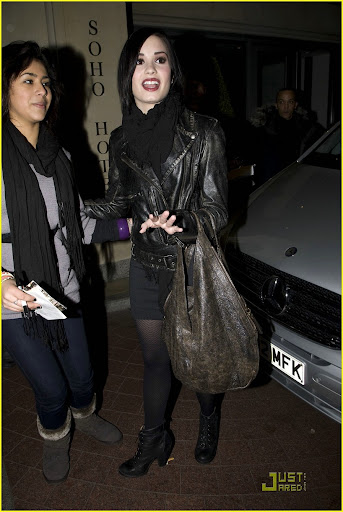 37123, LONDON, UNITED KINGDOM - Sunday January 24, 2010. Demi Lovato leaves Radio One studios after appearing on the 'Switch' show with DJs Nick Grimshaw and Annie Mac. Demi is swarmed by fans as she signs autographs and poses for pictures. Back at her hotel she is greeted by more fans waiting for her outside, some reportedly had been waiting for her overnight. Photograph: Ringo, PacificCoastNews.com **FEE MUST BE AGREED PRIOR TO USAGE****E-TABLET & MOBILE PHONE APP PUBLISHING REQUIRES ADDITIONAL FEES** UK OFFICE:+44 131 557 7760/7761 US OFFICE:1 310 261 9676