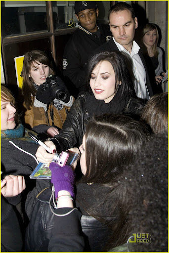 37123, LONDON, UNITED KINGDOM - Sunday January 24, 2010. Demi Lovato leaves Radio One studios after appearing on the 'Switch' show with DJs Nick Grimshaw and Annie Mac. Demi is swarmed by fans as she signs autographs and poses for pictures. Back at her hotel she is greeted by more fans waiting for her outside, some reportedly had been waiting for her overnight. Photograph: Ringo, PacificCoastNews.com **FEE MUST BE AGREED PRIOR TO USAGE****E-TABLET & MOBILE PHONE APP PUBLISHING REQUIRES ADDITIONAL FEES** UK OFFICE:+44 131 557 7760/7761 US OFFICE:1 310 261 9676