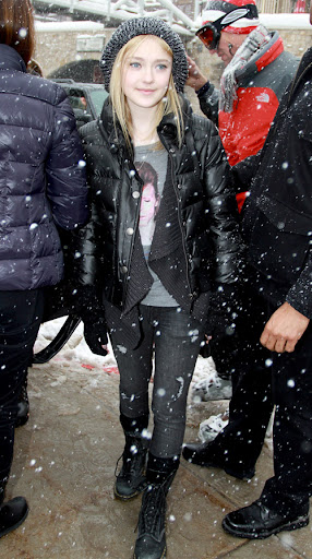 January 22, 2010: Dakota Fanning bares the snowy weather for the Sundance FIlm Festival in Park City, Utah.
Credit: Eric Brogmus/INFphoto.com  Ref.: infusla-55/82