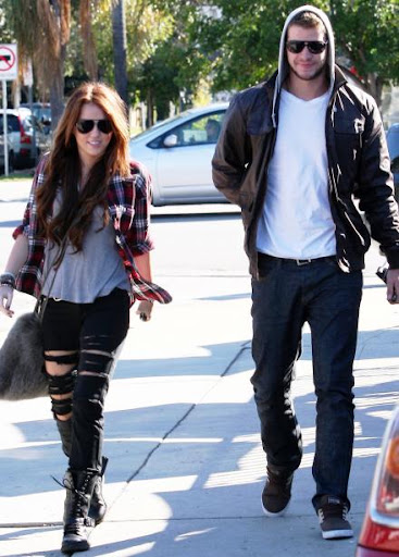 miley-sexy-ripped-black-jeans (52).jpg