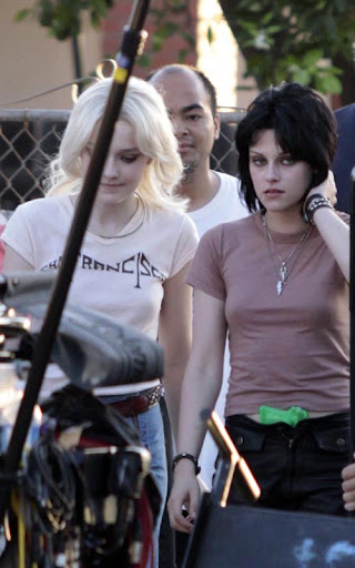07-22-09 Los Angeles, CAActresses Kristen Stewart and Dakota Fanning on the set of their upcoming movie 'The Runaways' in Los Angeles. In a couple scenes Kristen has a neon green water gun stuffed in the front of her pants...Non-Exclusive Pix by Flynet ©2009818-307-4813  Nicolas310-869-0177  Scott