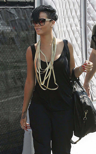 #3357317 Rihanna is all smiles as she steps off a helicopter at the 34th street Heliport in New York City, New York August 3, 2009 on her arrival back from a weekend in the Hamptons. Rihanna oddly was sporting a gold ring on that very important finger on her left hand, but it might just be to match her gold bling for today’s outing. Fame Pictures, Inc - Santa Monica, CA, USA - +1 (310) 395-0500