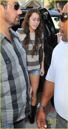 Popstar/actress Miley Cyrus is seen arriving to film a WalMart commercial in LA today. It is unsure what she was filming but the production company went to crazy lengths to stop media getting photos even installing 10 foot curtains to hide her from view. She is also seen later inside her waiting suv on departure. <P>  <B>Ref: SPL121539  250809  </B><BR/> Picture by: Hot Shots Worldwide <BR/> </P><P> <B>Splash News and Pictures</B><BR/> Los Angeles:	310-821-2666<BR/> New York:	212-619-2666<BR/> London:	870-934-2666<BR/> photodesk@splashnews.com<BR/> </P>