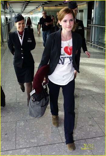 ©BAUER-GRIFFIN.COM Emma Watson arrives to Heathrow airport  wearing an "I love NY" shirt. NON-EXCLUSIVE      September 20 , 2009    Job:  90921W7     London, England  www.bauergriffin.com www.bauergriffinonline.com [491]