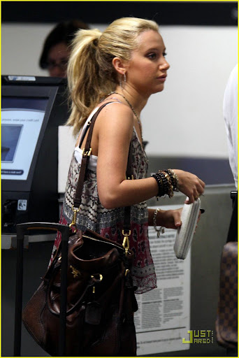 35057, LOS ANGELES, CALIFORNIA - Wednesday October 21, 2009.**EXCLUSIVE** Ashley Tisdale is spotted being dropped off at the Burbank Airport by her Mother. Ashley is off to Arizona to perform a concert over the weekend. She wore short jean shorts, leather moccasins and pulled a Louis Vuitton suitcase. Photograph: Matt Symons, PacificCoastNews.com ***FEE MUST BE AGREED PRIOR TO USAGE*** UK OFFICE: +44 131 557 7760/7761/7762 US OFFICE: 1 310 261 9676