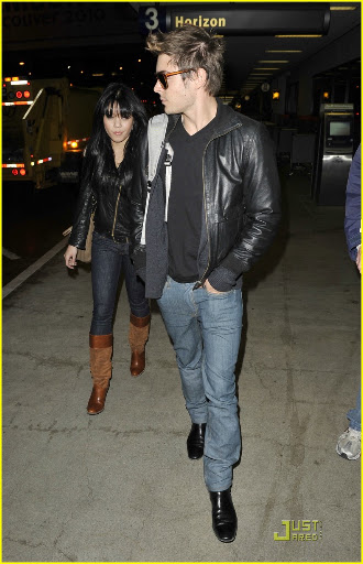 Actor Zac Efron is seen with his actress girlfriend Vanessa Hudgens showing the world how they feel about each other by holding hands after arriving back to LA from Vancouver. <P> Pictured: Zac Efron with girlfriend Vanessa Hudgens <B>Ref: SPL145289 111209 </B><BR/> Picture by: Hot Shots Worldwide<BR/> </P><P> <B>Splash News and Pictures</B><BR/> Los Angeles: 310-821-2666<BR/> New York: 212-619-2666<BR/> London: 870-934-2666<BR/> photodesk@splashnews.com<BR/> </P>