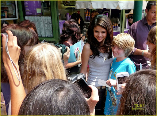 © BAUER-GRIFFIN.COM***NO CANADA RIGHTS***Selena Gomez, Leighton Meester, and Katie Cassidy practice a playful handshake while on the set of "Monte Carlo" outside the Hotel De Paris. NON-EXCLUSIVE      June 29, 2010Job: 70352EX       Monte Carlo, Monacowww.bauergriffin.comwww.bauergriffinonline.com