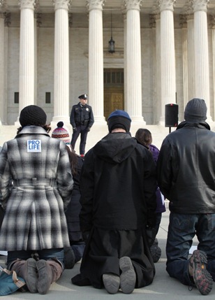 Demonstrators Kneeling