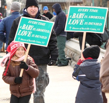 Children with anti-abortion placards