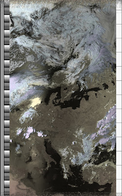 NOAA 15 northbound 66E at 10 Jul 2010 14:31:11 GMT on 137.50MHz, HVC enhancement, Normal projection, Channel A: 2 (near infrared), Channel B: 4 (thermal infrared)