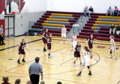 Pella Christian moves the ball against Oskaloosa