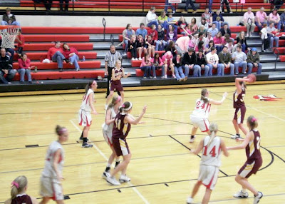 Pella Christian works the ball around on offense