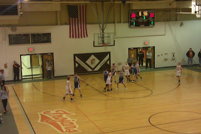 The Pleasantville girls work the ball around on offense during the second half of their game Saturday against Van Meter.