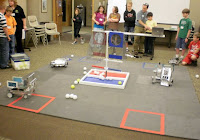 Students work hands-on with robots at "Explore Engineering"