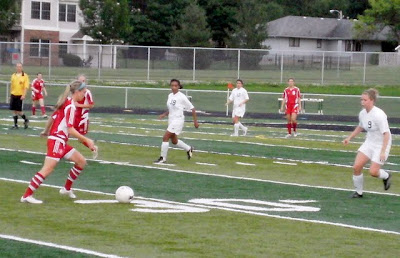 The Pella defense steps up to stop the ball
