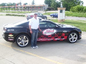 NASCAR Nationwide Series Driver Michael Annett with the Iowa Speedway pacecar in Knoxville on Monday.