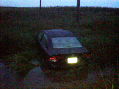 This car went into the ditch on Highway 163 near mile marker 36 this morning after hydroplaning.