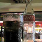Enjoy a 12 oz. bottle of Coca-Cola at Mamma Maria's Pizzeria