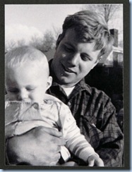 Larry Miller holding his eldest song Greg in 1967