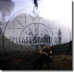 Please Stand By
