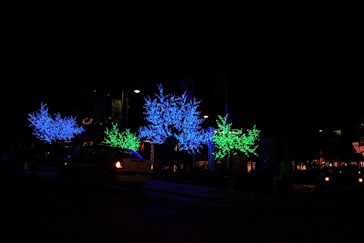 Previous Christmas decorations but at night.