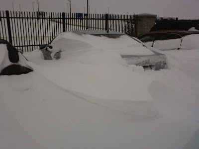 Snow drift over Jetta.
