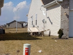 My patio table and a few chairs ended up by the neighbor's house.