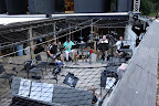 Better view of the pit area with some of the performers warming up. For as much sound as they put out, I expected thirty some people!