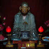 Hanoi. This may be a religion
 I can really get in tune with.
As you'll notice from the offering 
on the plate on the right, 
this Buddha likes cookies.