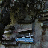 Also in Sagada, these are the 
hanging coffins. The blue one 
is recent from August 05 (I was there
 in October). Village elders are 
still buried in these coffins today.