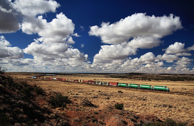 A 95 car train across the vast Arizona landscape on its way to Holbrook to interchange with the BNSF. A 95 car train across the vast Arizona landscape on its way to Holbrook to interchange with the BNSF.