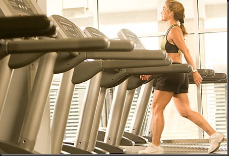 webmd_photo_of_trainer_walking_on_treadmill webmd_photo_of_trainer_walking_on_treadmill
