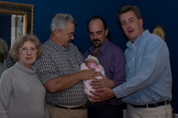 The Scott clan fighting over who holds Sam more...