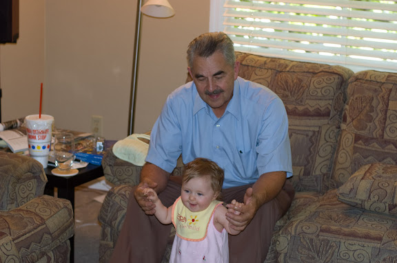 And trying to learn how to walk before she learns how to crawl.