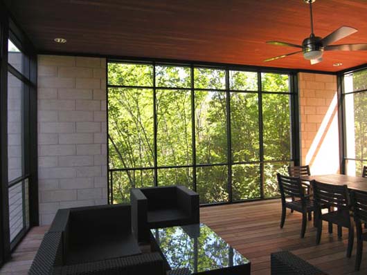 modern lake home design glass wall