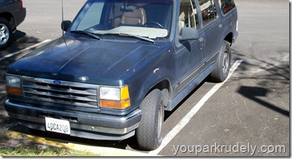 Blue Ford truck on the line - youparkrudely.com