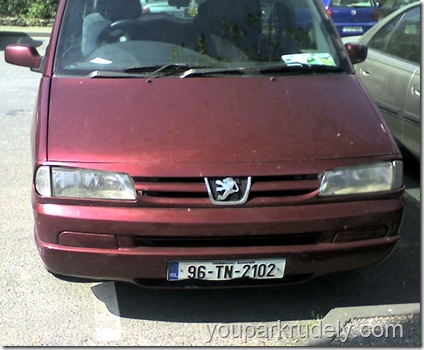 Red Peugeot parked rudely in Ireland - youparkrudely.com