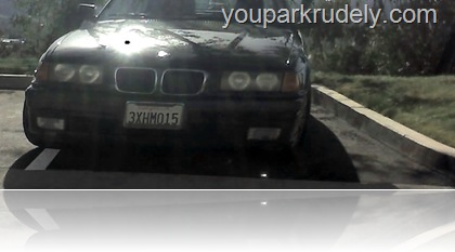 Black BMW parked rudely - youparkrudely.com