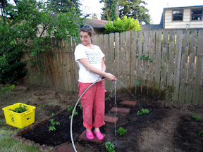 Mia watering the garden