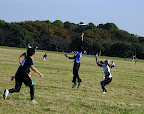 Maki tries to touch the sky, both feet off the ground!