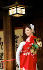 She was taken to this spot specifically to be posed by an ojisan, I can't believe she complied!