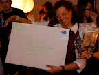 Mrs. Foote shows off the present that would be chosen first