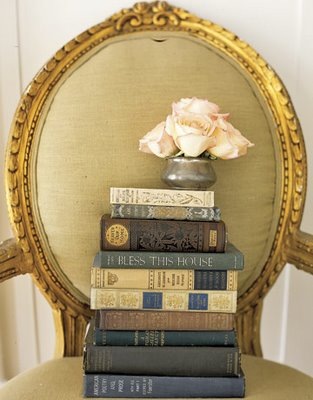 [books and roses on chair via charm hill interiors blog via linen & velvet[3].jpg]